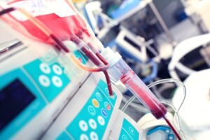 A patient is given blood through an IV as part of treating testicular cancer.