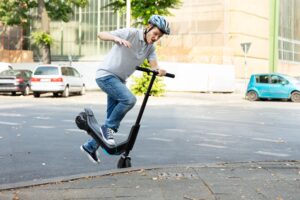 RIDER BEING THROWN FROM AN E-SCOOTER