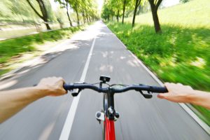 Cyclist driving on road.